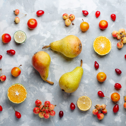 Imagen para representar "Mentorías creativas: cosechar frutos". Aparecen frutas (peras, albaricoque...)